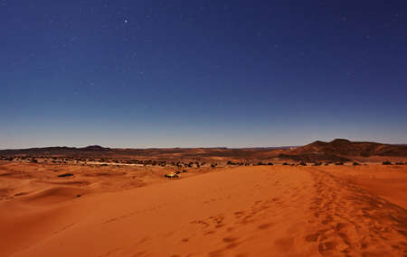 Stars at night over the dunes, Sahara Desert, Merzouga, Moroccoの写真素材