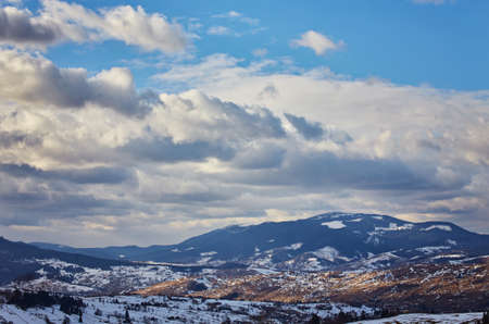winter landscape, view of the city in the carpathiansの写真素材
