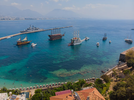 View from a height to the port of Alanya. sea harbor. Mediterranean Sea. Lighthouses in the harbor at the exit from the water area of the port of Alanya. Turkey. aerial photography. Panoramaのeditorial素材