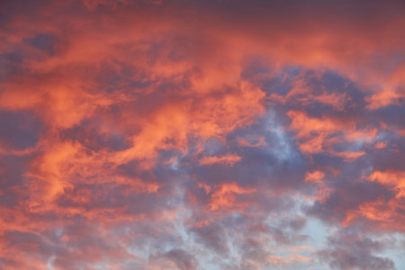 Colorful cloudy sky at sunset. Gradient color. Sky texture, abstract nature background