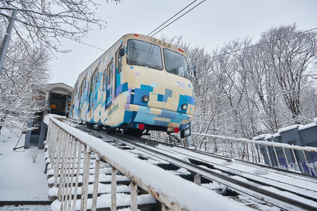 Kyiv funicular railway. cable car on the hill. Kyiv, Ukraine in winter. public transport. View on Dnipro river.のeditorial素材
