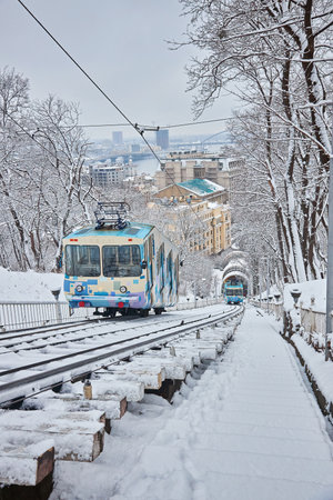 Kyiv funicular railway. cable car on the hill. Kyiv, Ukraine in winter. public transport. View on Dnipro river.のeditorial素材