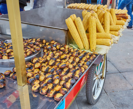 Chestnut and corn roasts in istiklal street , istanbul.They ara some of the most common street foods in the cityのeditorial素材