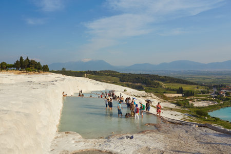 March 03, 2018, Pamukkale, Denizli, Turkey, Pamukkale, meaning cotton castle in contains hot springs and travertines, terraces of carbonate minerals left by the flowing waterのeditorial素材