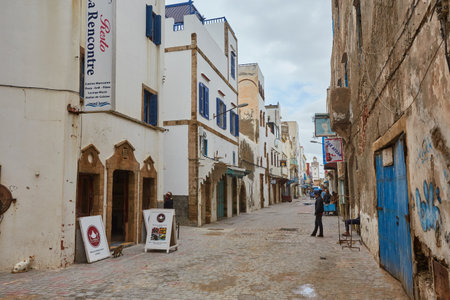 ESSAOUIRA, MOROCCO. 12 th February, 2017: Streets of the old city, Medina, colorful houses. People rushing to work, the city after the rainのeditorial素材