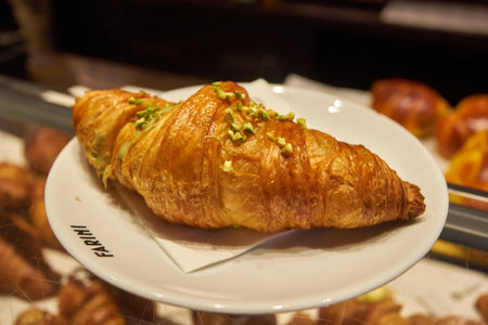 Tasty fresh croissants on counter. close up. selective focusの写真素材