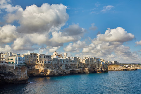 Spectacular spring cityscape of Polignano a Mare town, Puglia region, Italy, Europe. Colorful evening seascape of the Adriatic sea. Travel concept background.の写真素材