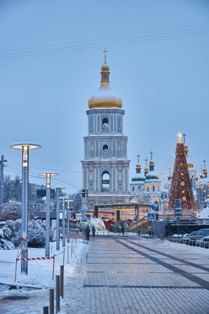 Christmas tree with lights outdoors at night in Kiev. Sophia Cathedral on background. New Year Celebrationの写真素材