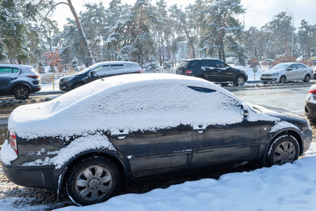 Car under the snow in the cityの写真素材