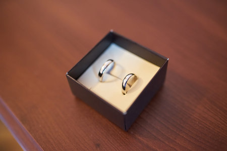 golden stylish wedding rings in a box. luxury rings with diamond