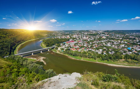 Top picturesque view of the spring Dnister river bend canyon and famous Ukrainian Zalischyky town....
