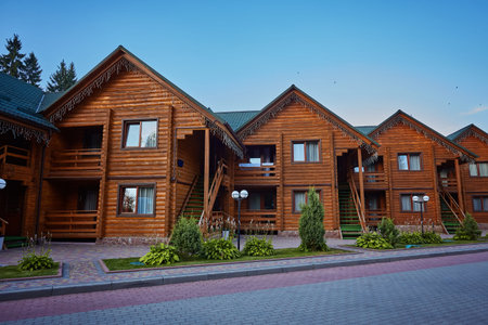 Wooden cottages in the ski resort Bukovel, Ukraine. Summer holidays in the Carpathian mountainsの写真素材