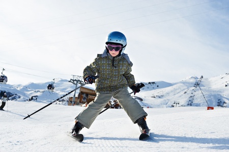 Small child skiing in French resortの写真素材