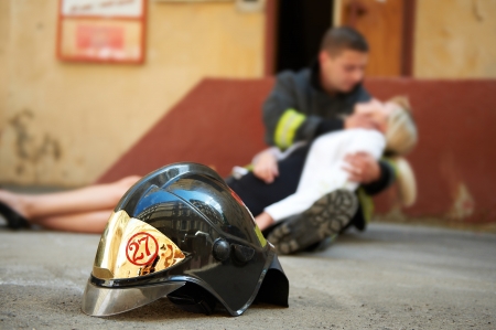 Saving women brave firefighters at a fireのeditorial素材