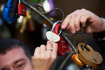 lock lovers as a symbol of marital happiness in hands of the newlyweds

のeditorial素材