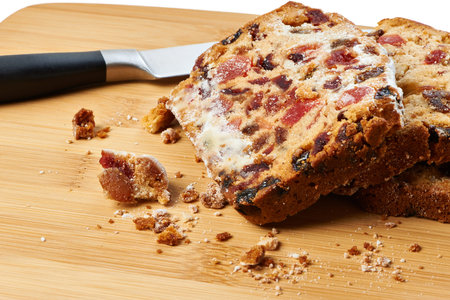 Pieces of fruitcake on a cutting board