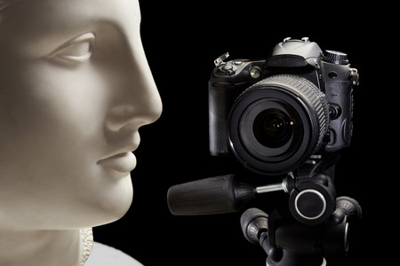 Shooting in studio plaster head in black backgroundの写真素材