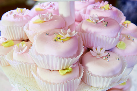 Beautiful cupcakes on wedding table close-upの写真素材