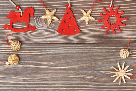Christmas ornament in row on vintage wooden plankの写真素材