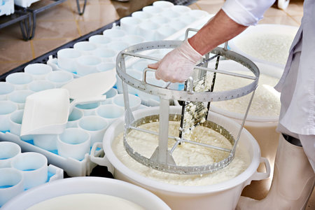 Mixing cheese material for the production of soft cheese