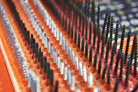 Macro photo, screw background, metal screw, steel screw, screw macro, repair screwの写真素材