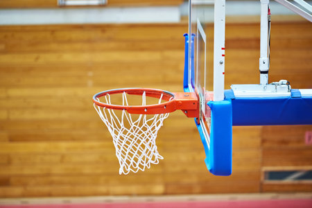 Basketball hoop in sports hall closeup