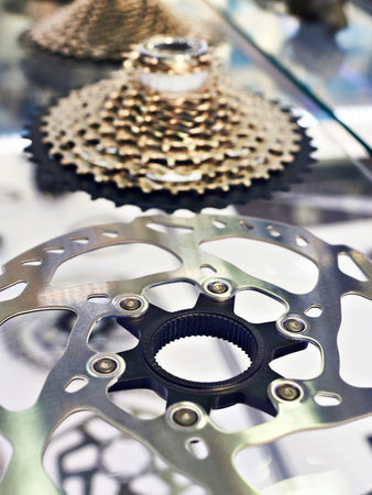 Disk brake and rear cassette stars of speeds in storefront of shop