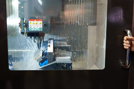 Work of an industrial machine with coolingの写真素材