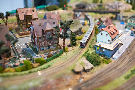 Toy railway with train and houses closeupの写真素材