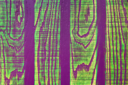 Abstract colored violet green background on wooden textureの写真素材