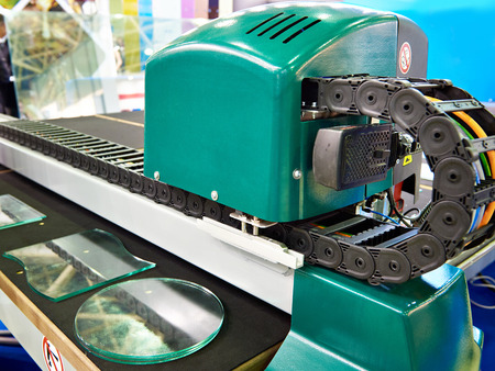 Modern machine for processing glass partsの写真素材