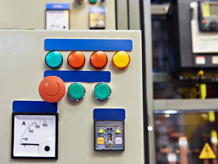 Equipment and systems control stand in industrial plant with different buttonsの写真素材