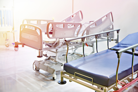 Medical beds for hospital patients indoors nobodyの写真素材