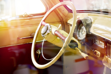 Steering wheel and interior of a retro carの写真素材