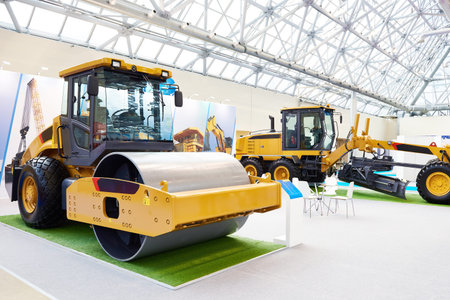 New road roller and motor grader on exhibition