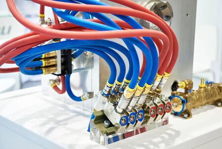 Hydraulic equipment with hoses and connectorsの写真素材