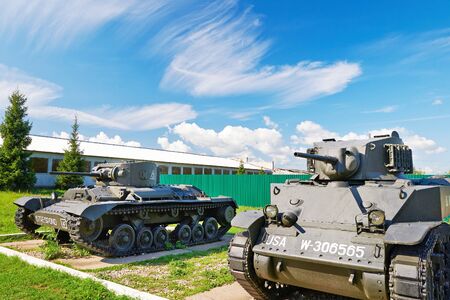 MUSEUM KUBINKA, MOSCOW REGION, RUSSIA - Aug 23, 2014: Light tank "Stuart" and infantry tank Mk.III Valentine VI  in museumのeditorial素材