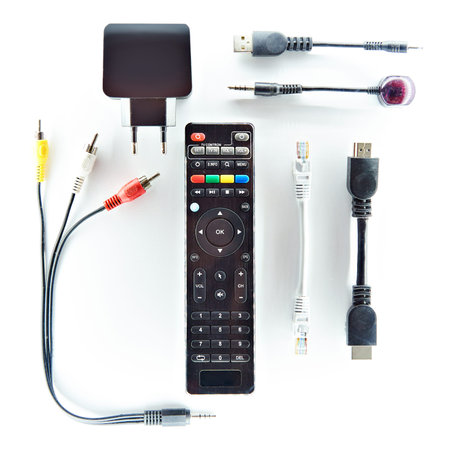 Remote control TV and wire connectors isolated white