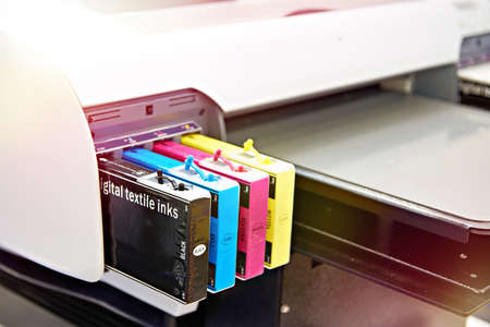 Embroidery industrial machine in sewing workshopの写真素材