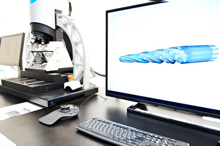 Automatic band saw with a steel workpieceの写真素材