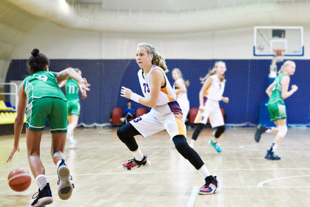 Girl play basketball sport tournamentの写真素材