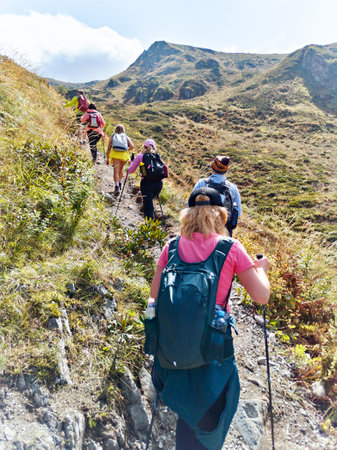 Group of tourists on trekking in the mountainsの写真素材