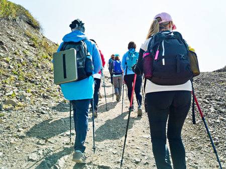Group of tourists on trekking in the mountainsの写真素材