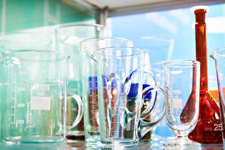 Laboratory glass dishes, bottles, jars and flasks in storeの写真素材