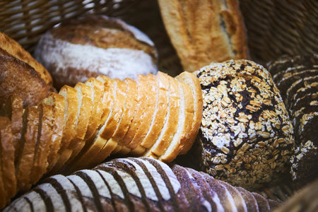 Fresh bread and rolls and as a backgroundの写真素材