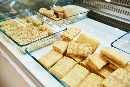 Stuffed pancakes on a shop windowの写真素材