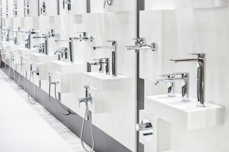 Modern kitchen and bathroom water faucets in the store