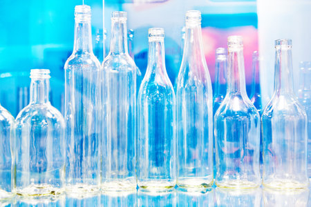 Empty bottles for alcoholic drinks at a shop window