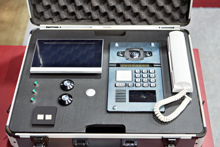 Box with intercom control panels and monitor