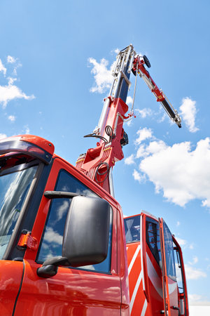Auto hydraulic lift crane on sky backgroundの写真素材